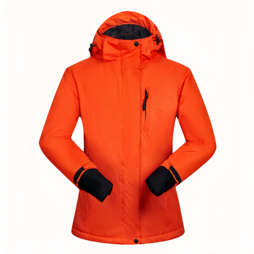 Oranje ski-jas met zwarte manchetten.