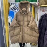 Beige donsjack met capuchon en trekkoord voor dames